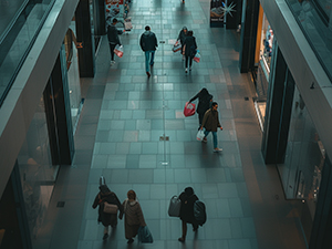 A top-down image of various people walking down a street